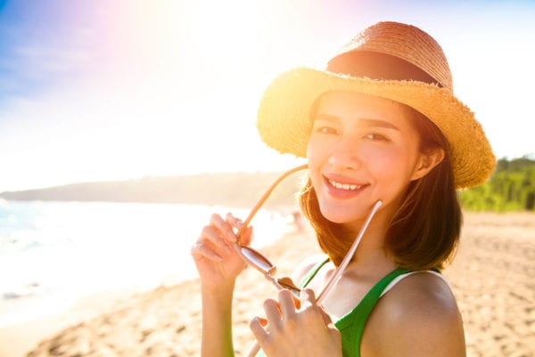 beautiful young woman enjoy summer vacation on the beach